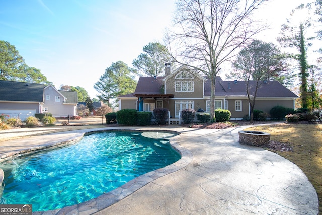 view of swimming pool featuring a patio area