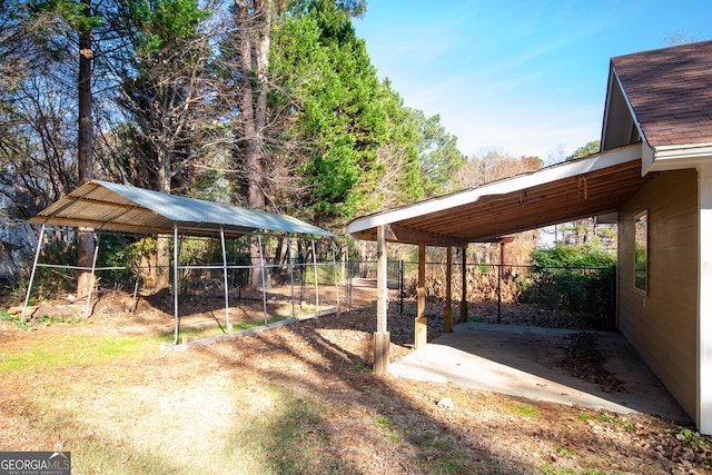 view of yard with a carport