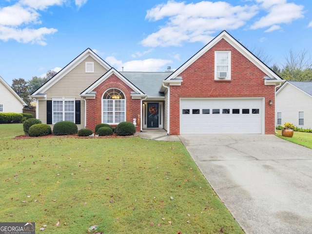 front facade featuring a front yard and a garage