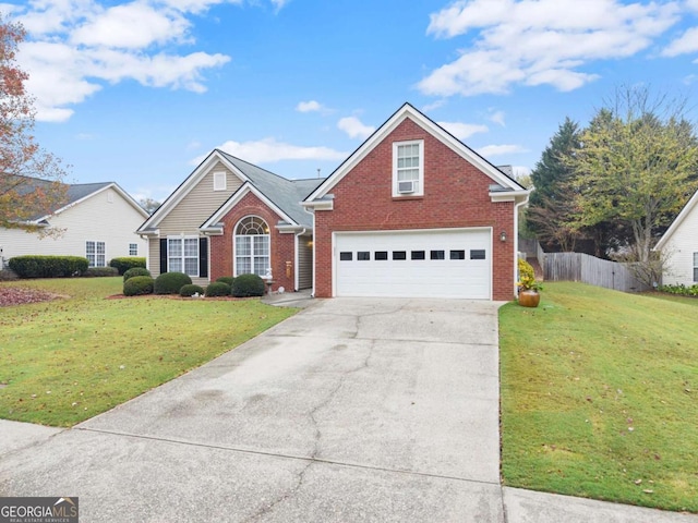 front of property featuring a garage and a front yard