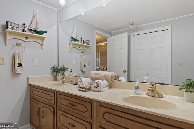 bathroom with crown molding, vanity, a textured ceiling, and walk in shower