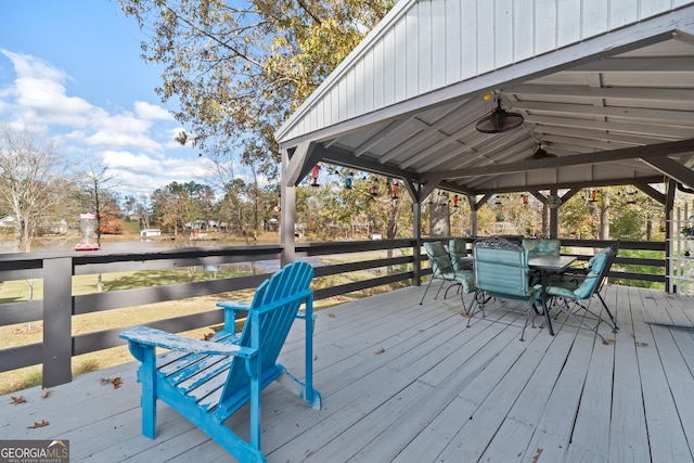 wooden terrace with a gazebo