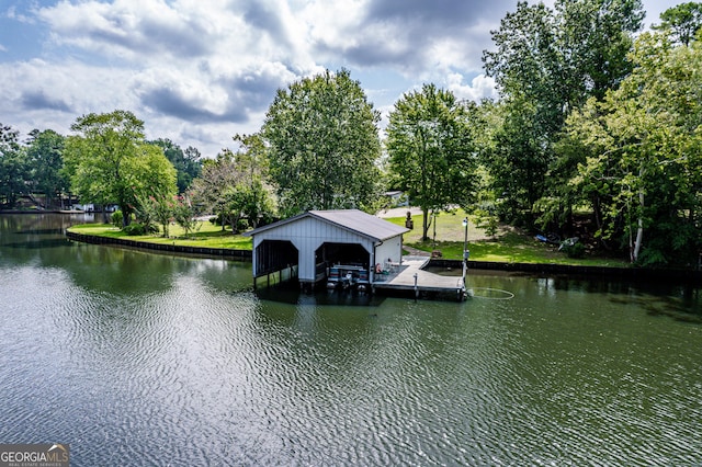 dock area with a water view