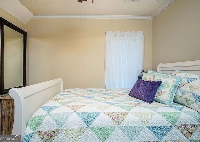 bedroom with crown molding