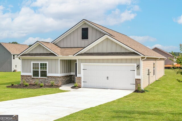 craftsman inspired home with a garage and a front yard