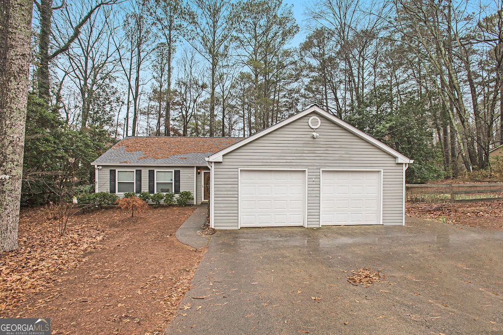 ranch-style house with a garage