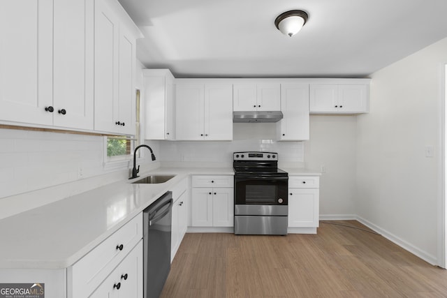 kitchen featuring light hardwood / wood-style floors, sink, white cabinetry, and stainless steel appliances