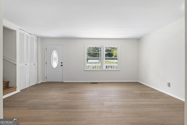 foyer entrance with light hardwood / wood-style flooring