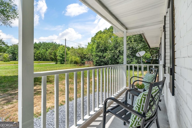 balcony featuring a porch