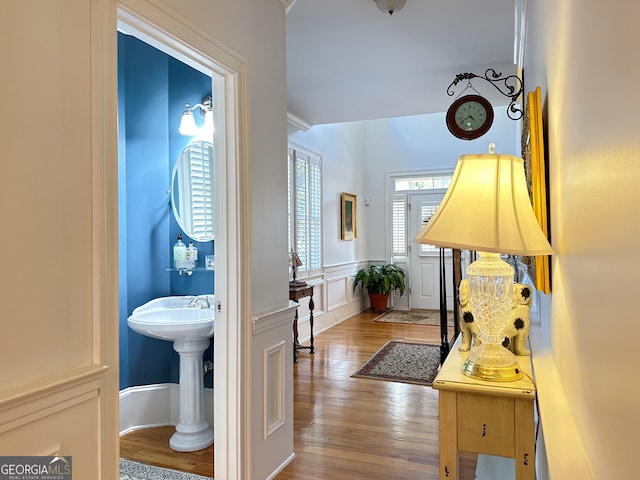 corridor featuring light hardwood / wood-style floors