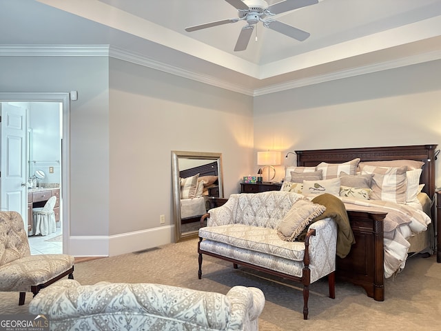 bedroom featuring a raised ceiling, ceiling fan, light carpet, and crown molding