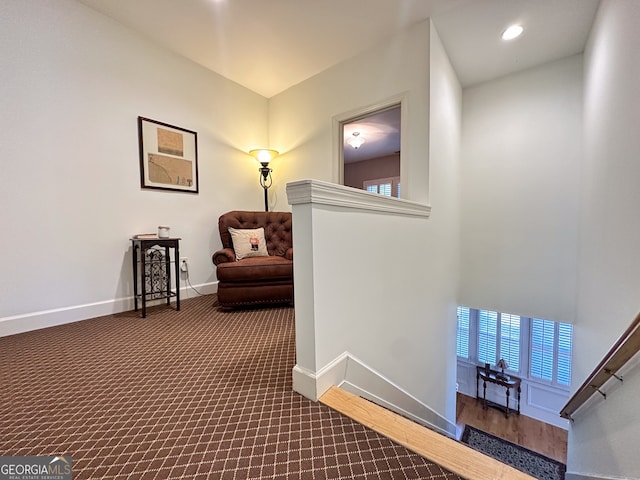 hallway featuring carpet floors