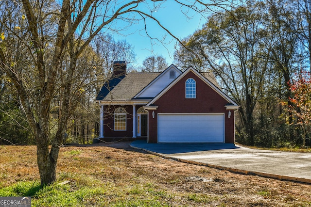 front facade with a garage