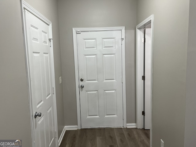 doorway to outside featuring dark hardwood / wood-style floors