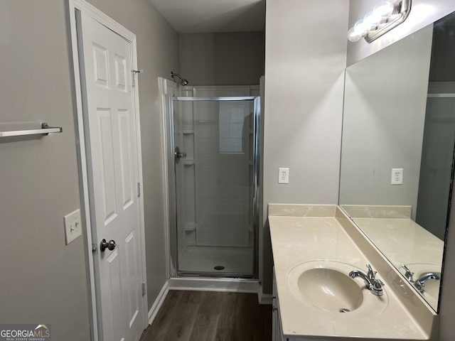 113 Ellis Dr, Conyers, GA 30012 - full bath with a stall shower, wood finished floors, and vanity