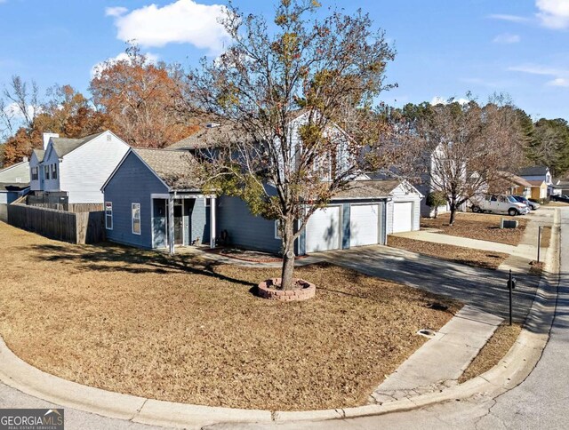 view of front of property featuring a garage