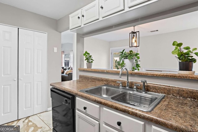 kitchen with dishwasher, white cabinets, sink, hanging light fixtures, and a wealth of natural light