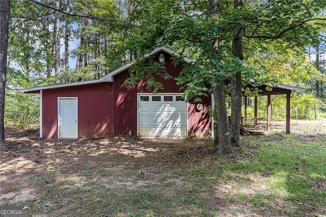 view of outbuilding with a garage