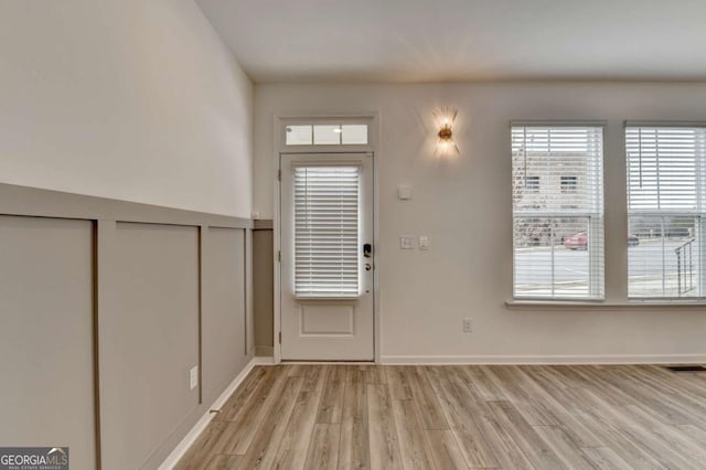 foyer entrance featuring light hardwood / wood-style floors