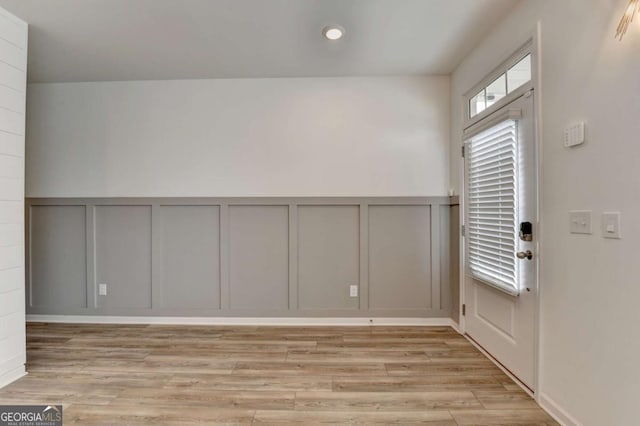 entrance foyer with light wood-type flooring