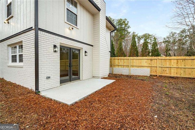 back of house featuring a patio area