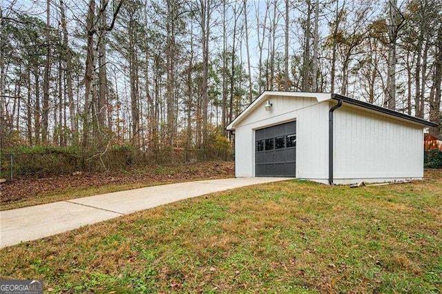 garage with a yard