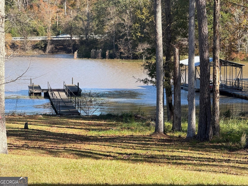 view of dock with a water view