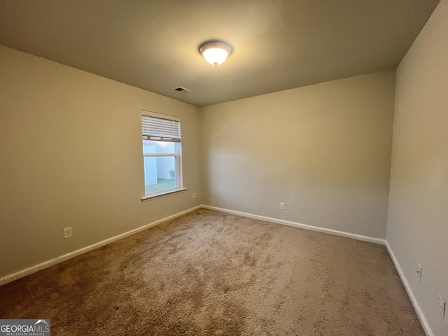 empty room with carpet floors