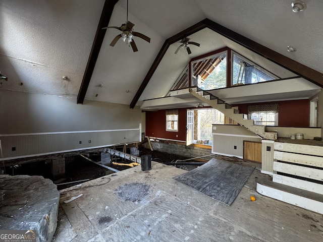 kitchen featuring vaulted ceiling and ceiling fan