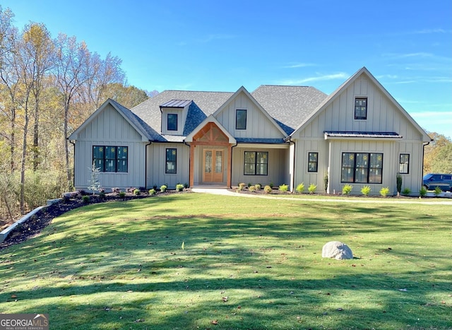 modern inspired farmhouse with french doors and a front yard