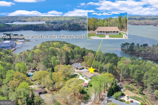 birds eye view of property featuring a water view