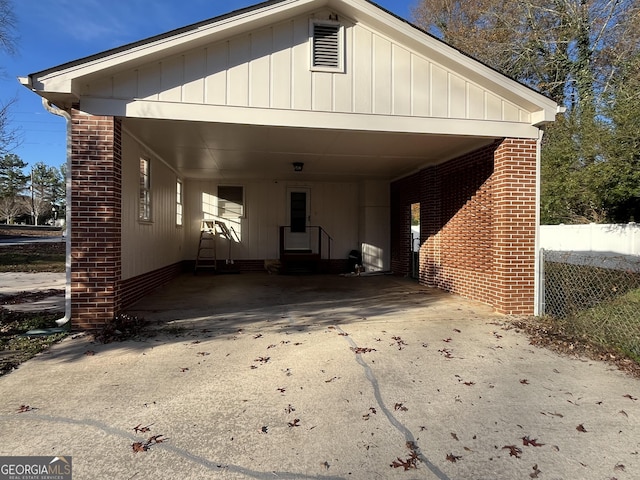 exterior space with a carport