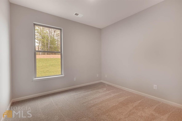 view of carpeted spare room