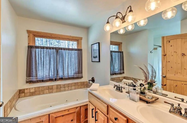 bathroom with vanity and a bathing tub