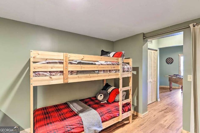 bedroom with hardwood / wood-style flooring