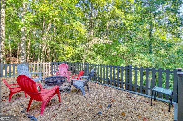 view of patio / terrace with an outdoor fire pit