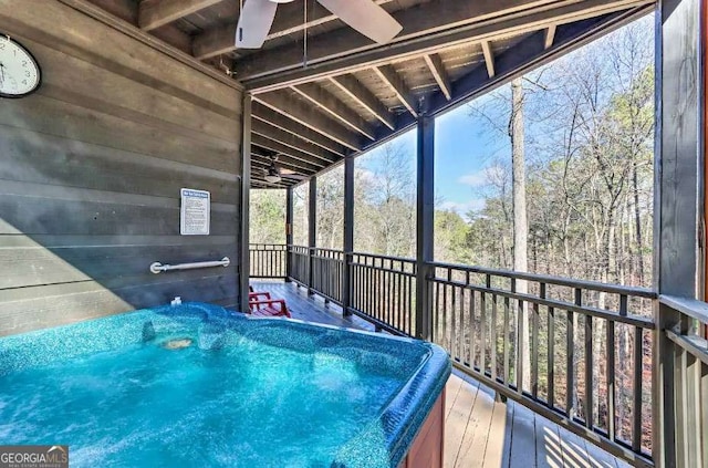 view of swimming pool with ceiling fan