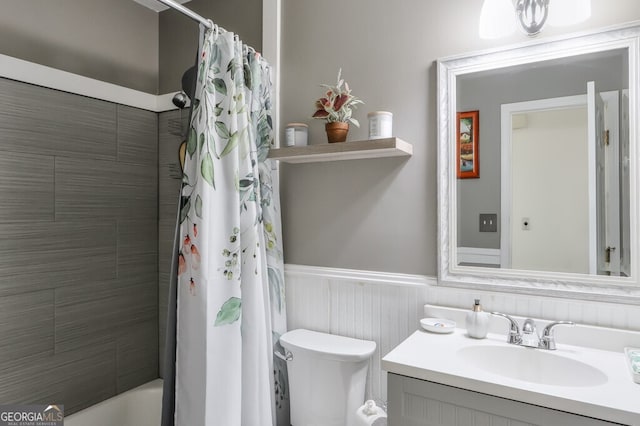 full bathroom featuring vanity, toilet, and shower / bath combo with shower curtain