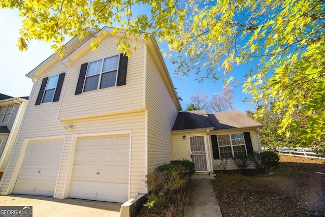 front of property featuring a garage