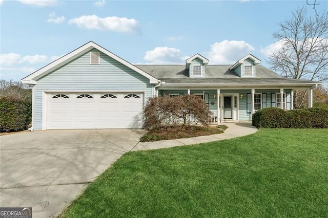 view of front of home featuring a front lawn and a garage