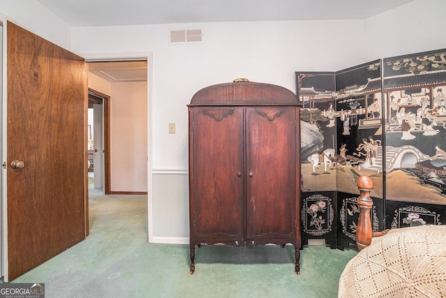 bedroom with light carpet