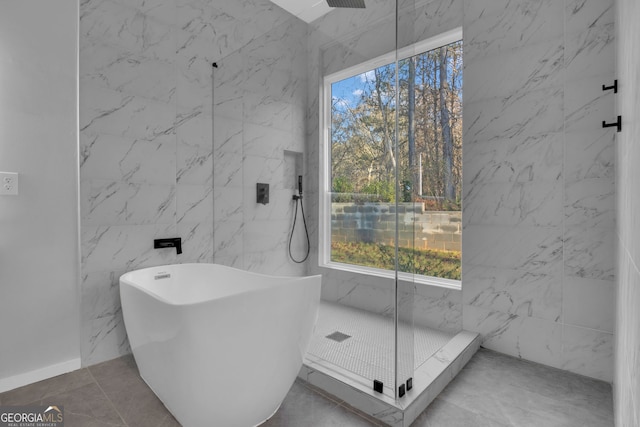 bathroom featuring tile patterned flooring and independent shower and bath