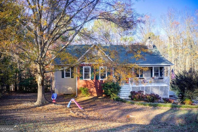 ranch-style house featuring a porch