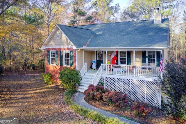 view of front of property featuring covered porch