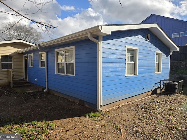 view of home's exterior featuring central air condition unit