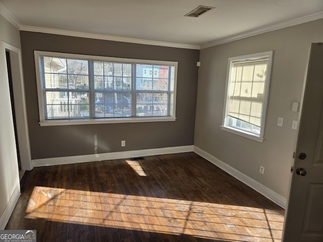 interior space featuring a wealth of natural light, hardwood / wood-style floors, and ornamental molding