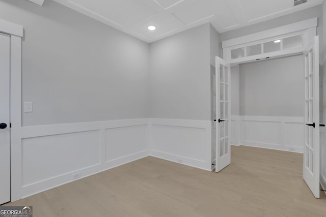 unfurnished room with light wood-type flooring