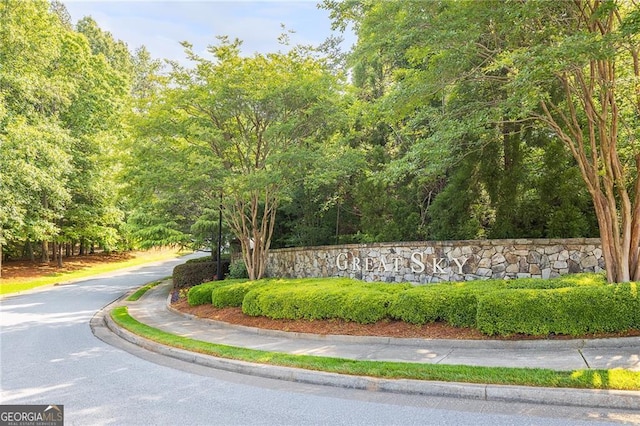 view of community sign