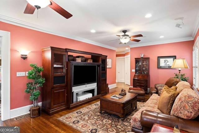 living room featuring dark hardwood / wood-style floors and ornamental molding