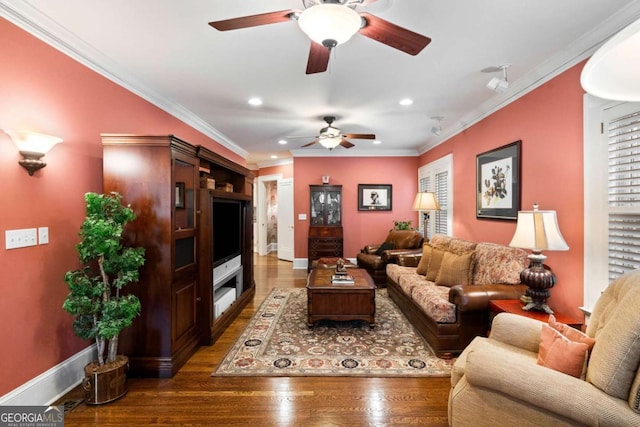 living room with dark hardwood / wood-style floors and crown molding